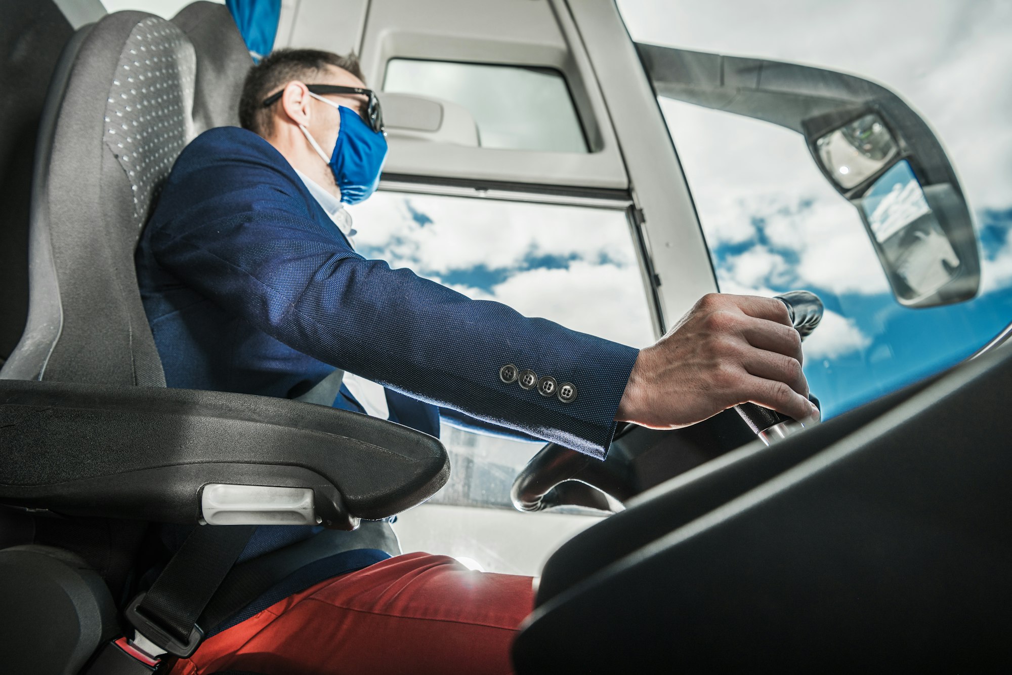 Modern Coach Bus Caucasian Driver Online CPC Courses