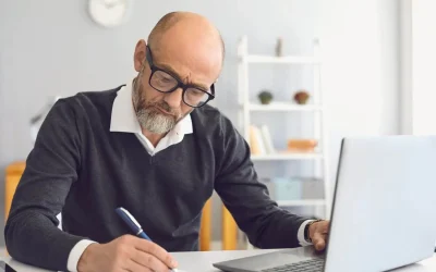 Driver completing Online Driver CPC Course UK on a laptop